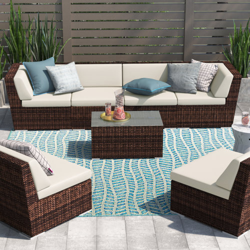 Orren Ellis Barneveld 7 Piece Rattan Sectional Seating Group with